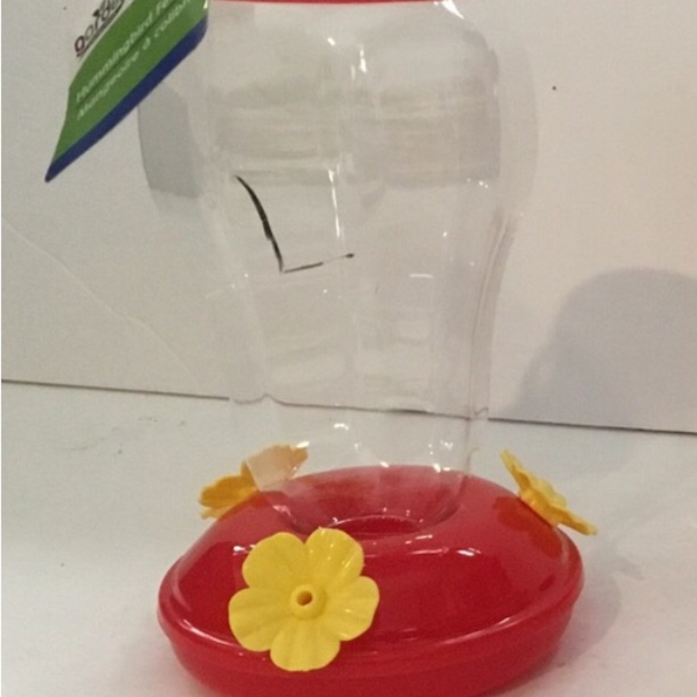 Hummingbird feeders with hooks. 7” x 4” diameter. New